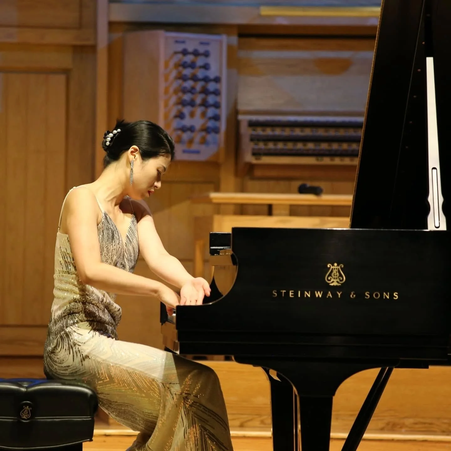 2025 Odyssiad&reg; Guest Artist and Odyssiad&reg; Gold Medalist Dongni Xie graced the Fort Collins stage, engaging the audience with her stunning performance and captivating narration of the repertoire. Her exquisite and dynamic playing truly showcas