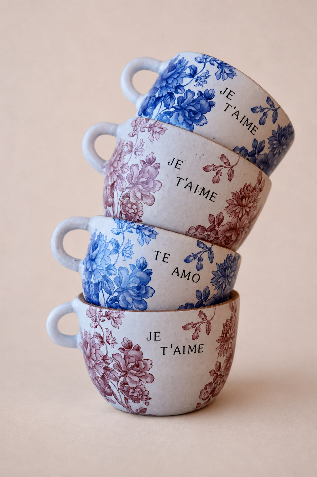 Handmade cups and saucers on blush-beige sweep.png
