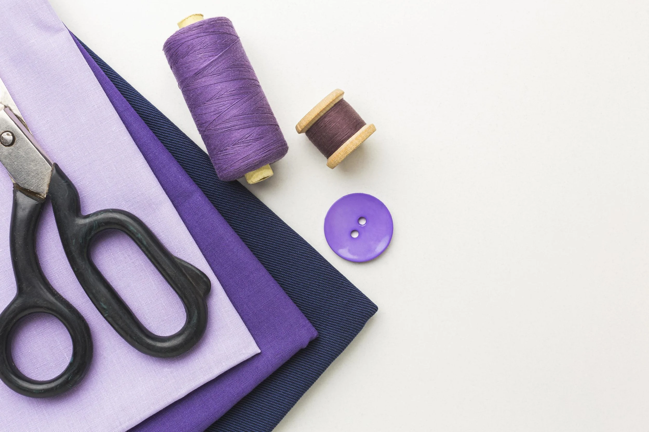 purple-fabric-and-sewing-tools-free-photo.jpg