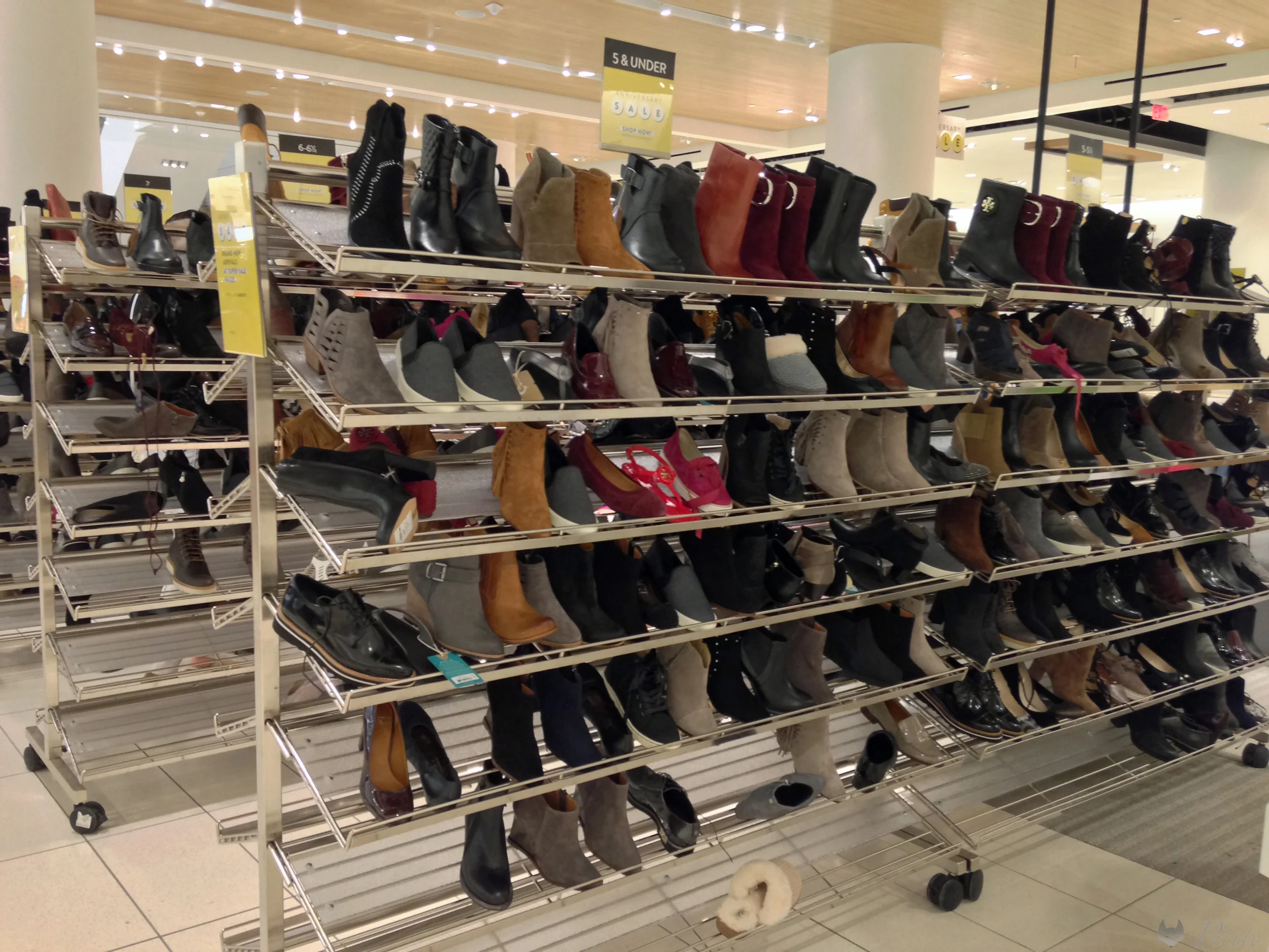 The left half of this rack is dedicated to "size 5 and under". Mostly ankle boots.