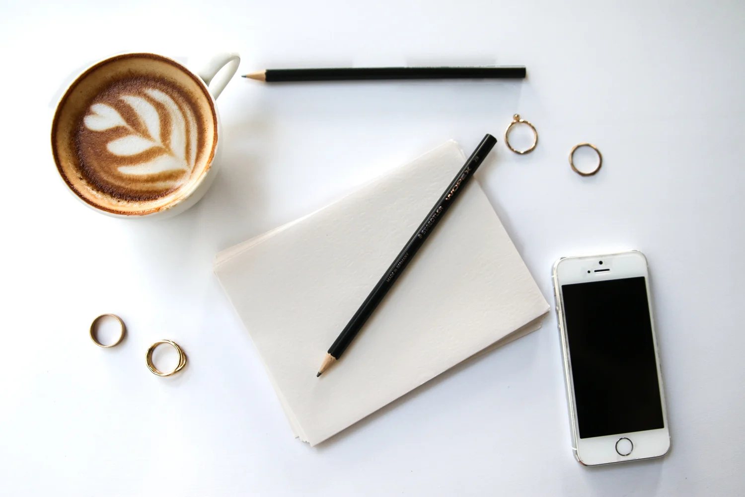 10 Free Stock Photos for Creative Entrepreneurs. No attribution required. Use how you please! Coffee, notes and iPhone stock photo.