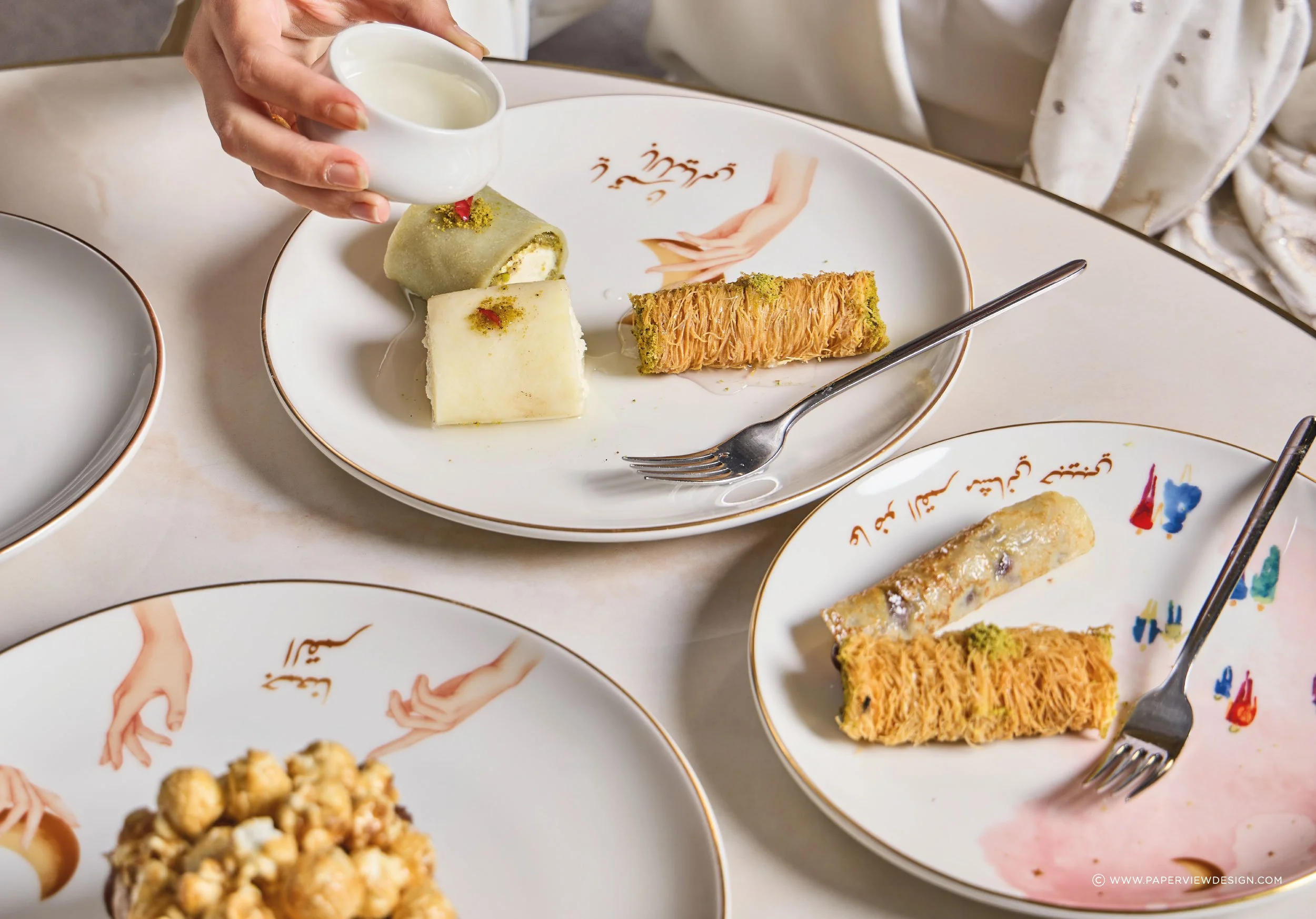 Amar-KSA-W-PlateDessertEating.jpg