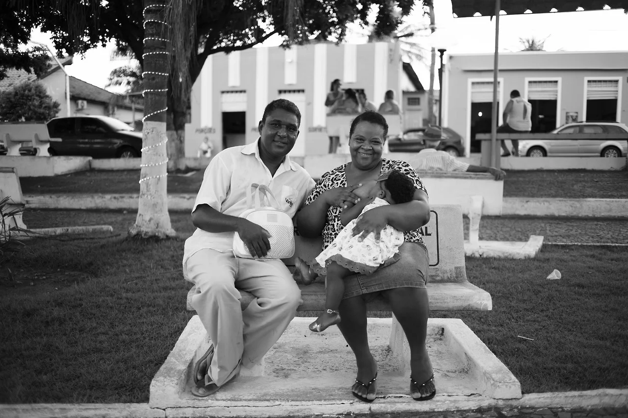 I met Sandy and her baby and husband when I was in Uru, Brazil. Thankfully my partner was with us and could translate so that I could ask to take their picture. Gorgeous family. I love this picture so much.