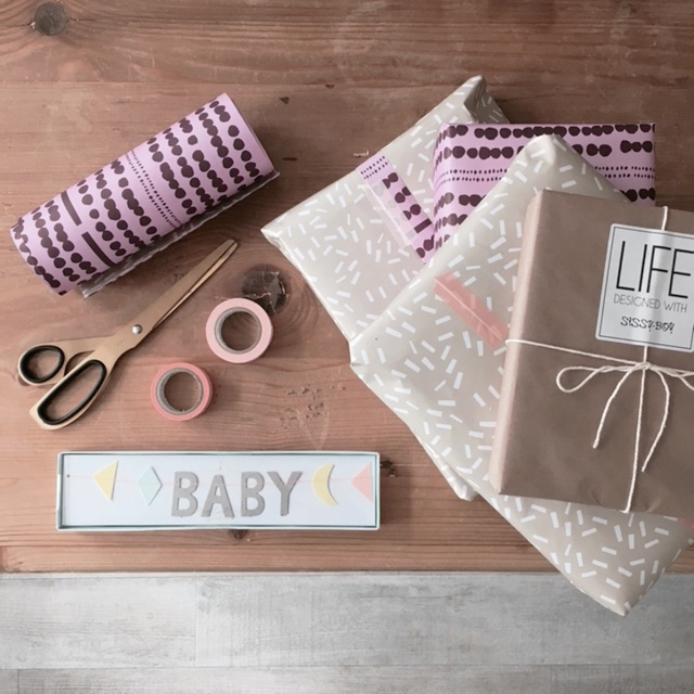 babyshower gifts wrapped garland.jpg