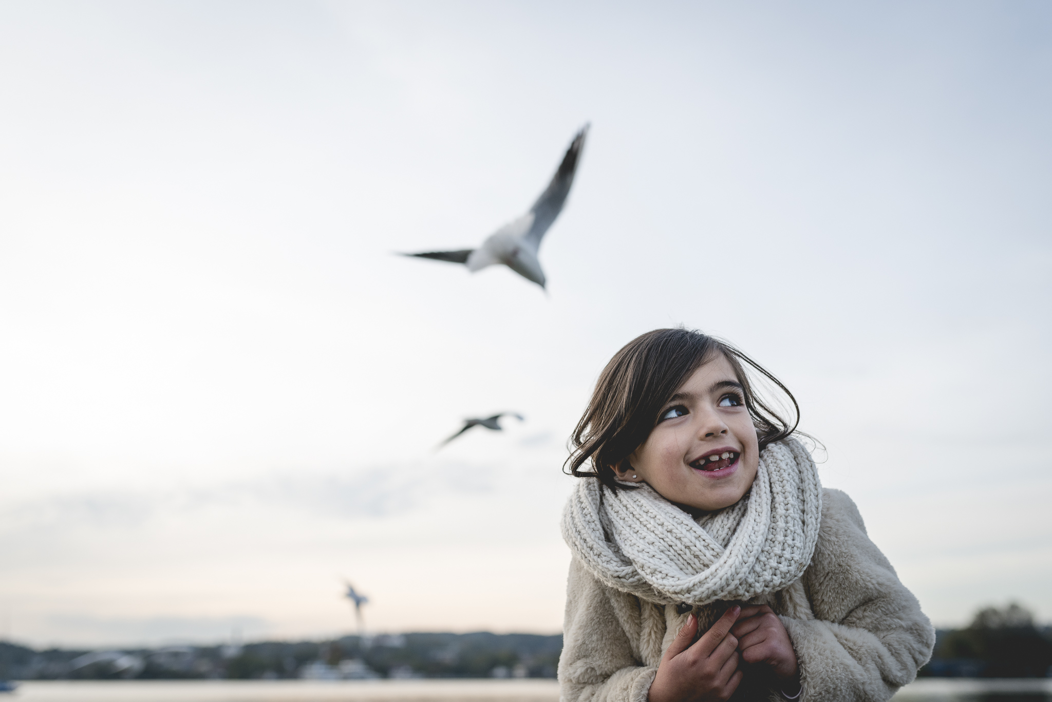 Girl feeding the birds