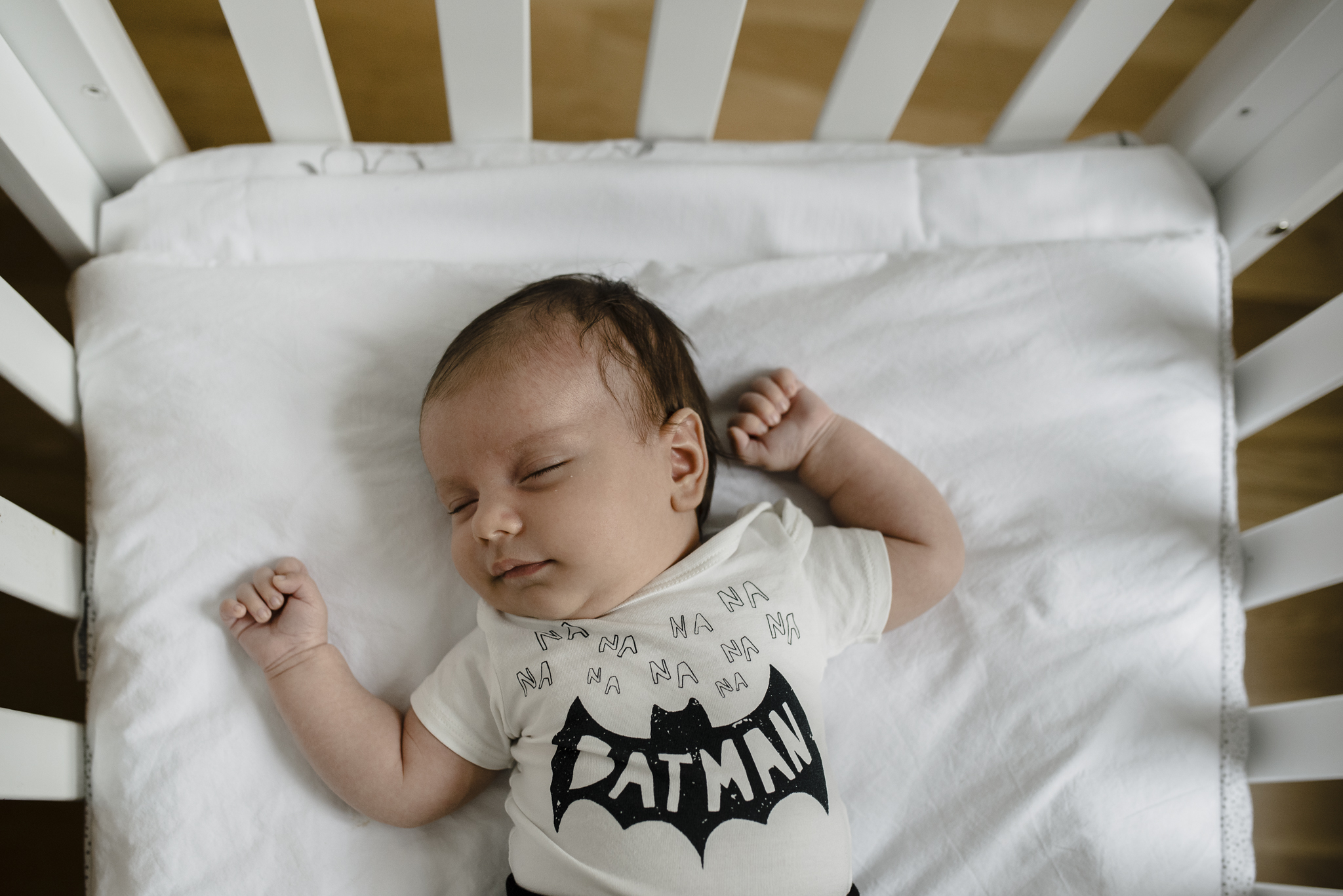 Sleeping baby with Batman body.jpg