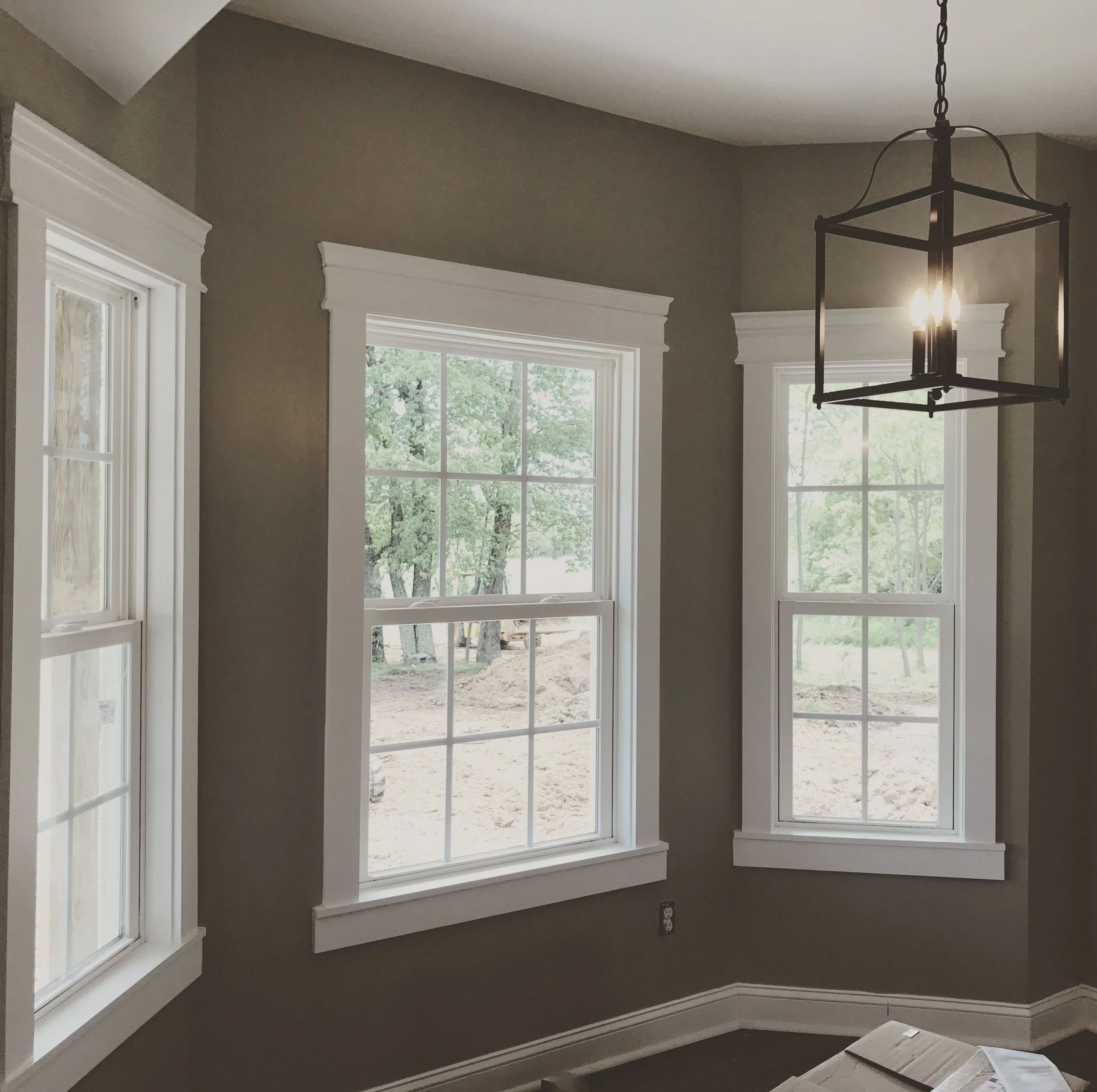 Beautiful farmhouse style trim work sets off the view of the countryside.