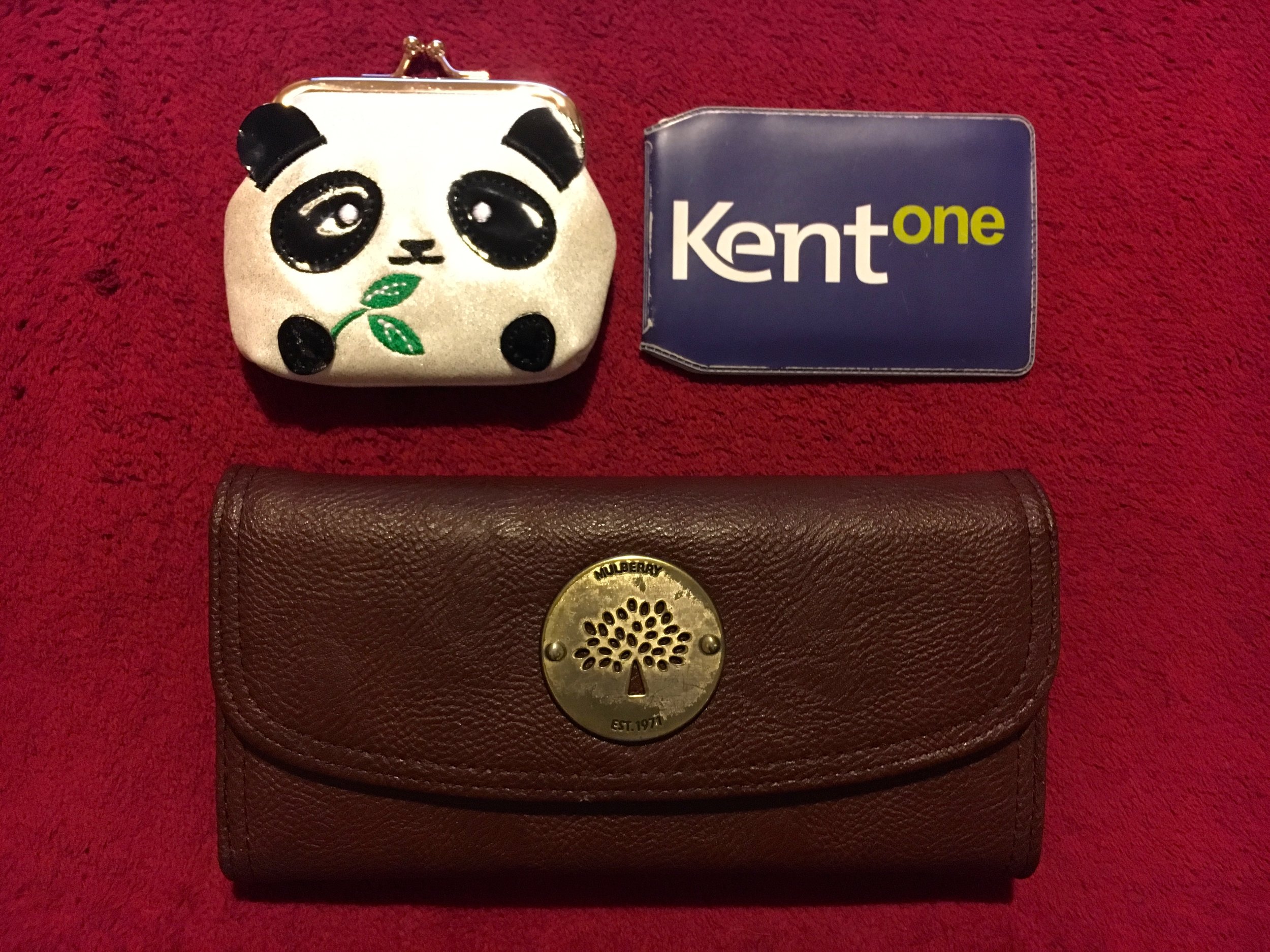 Keys go in the panda coin purse and the regular purse is a knock-off! God bless, Stanley Market.