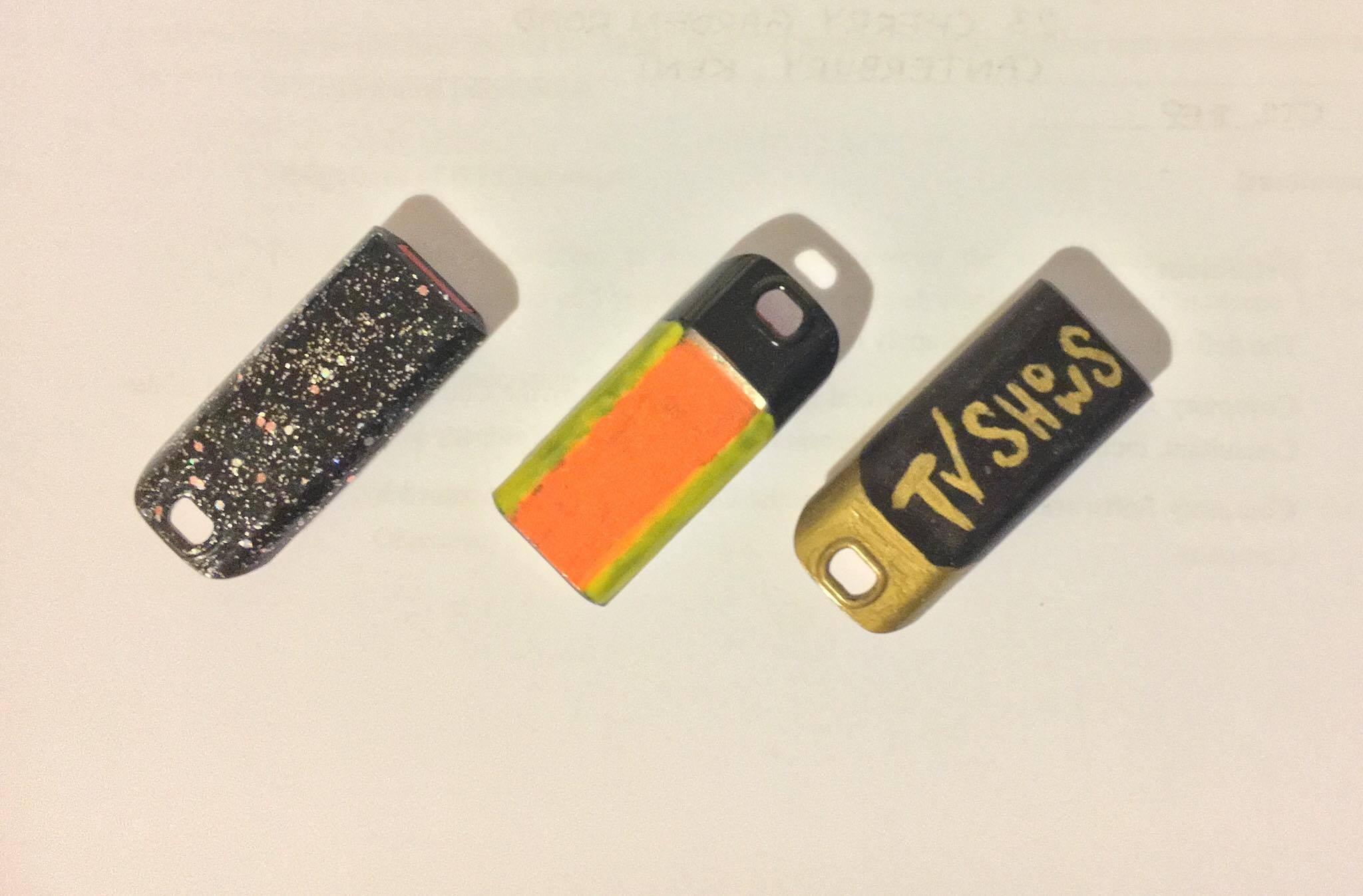 Some USBs that I use for movies, music, and TV Shows. I decorated them with nail polish and sharpies!