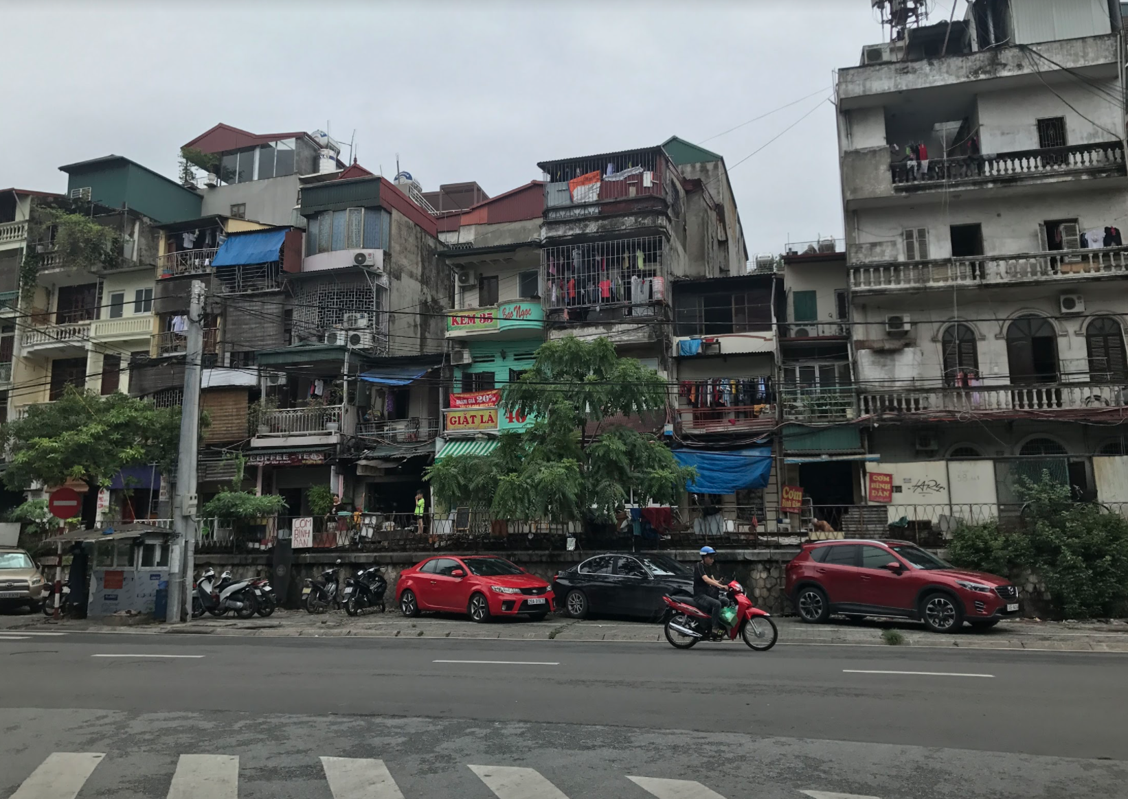 The streets of Hanoi, Vietnam - a familiar sight that I passed by daily as students and teachers went from the hotel we stayed at to schools where we taught. The business of the streets is unlike anything in the USA. 