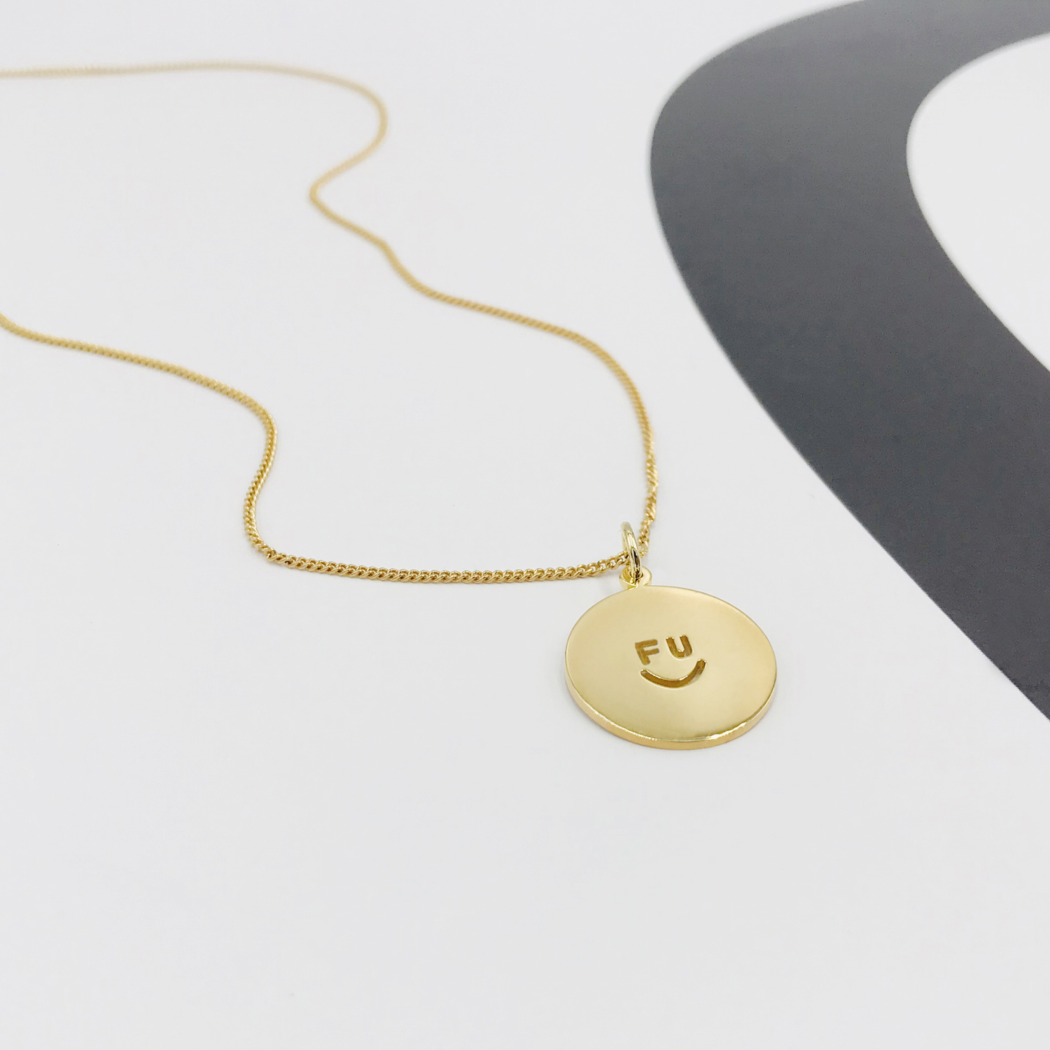 Face FU large gold.jpg