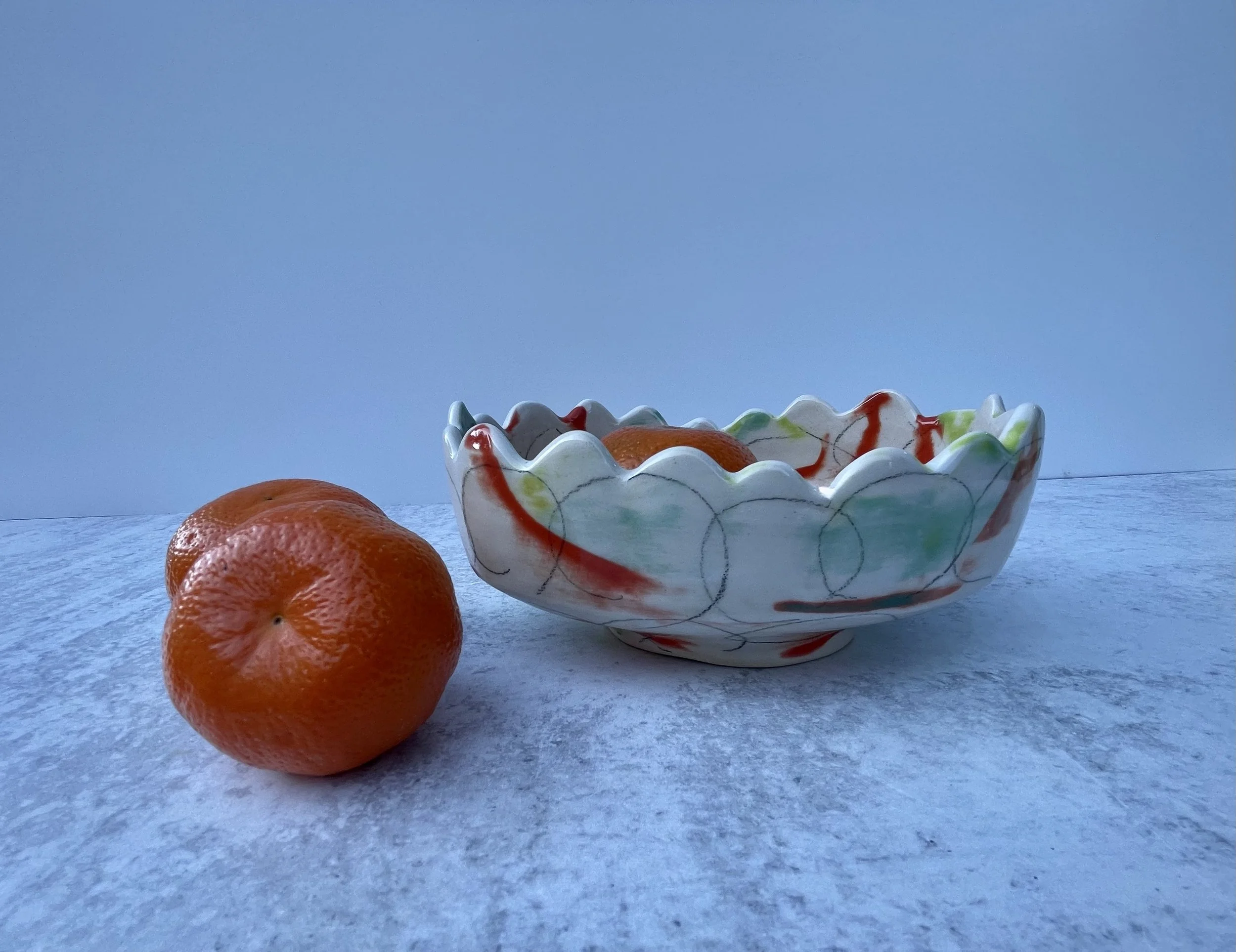 Points and Ruffled Catch All In Orange Crush