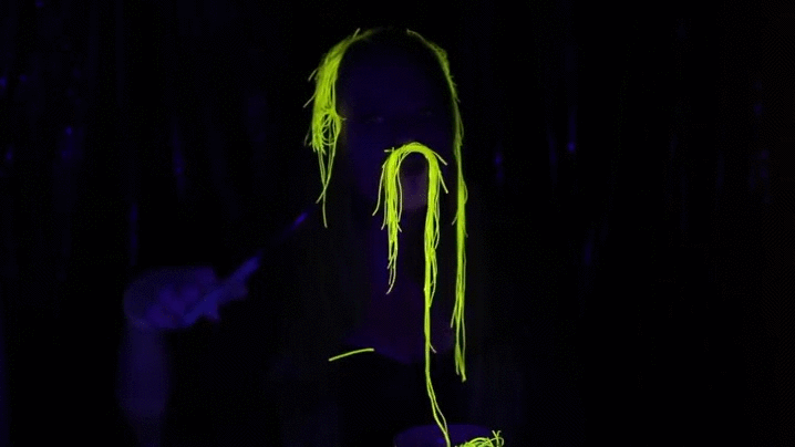 Edible yellow UV Glow in the Dark Noodles made with vitamin B2 (Riboflavin).