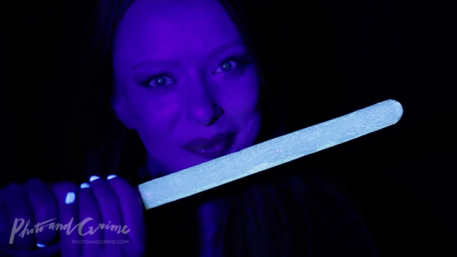 Edible blue UV Glow in the Dark Star Wars lightsaber made with quinine (Tonic).