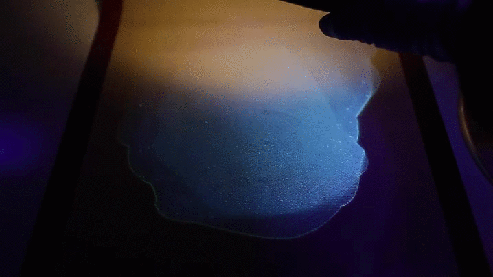 Translucent in normal light, blue in blacklight.