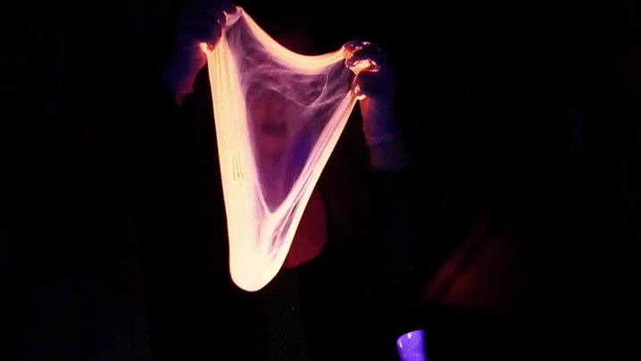 UV reactive glow slime made with UV reactive paint.