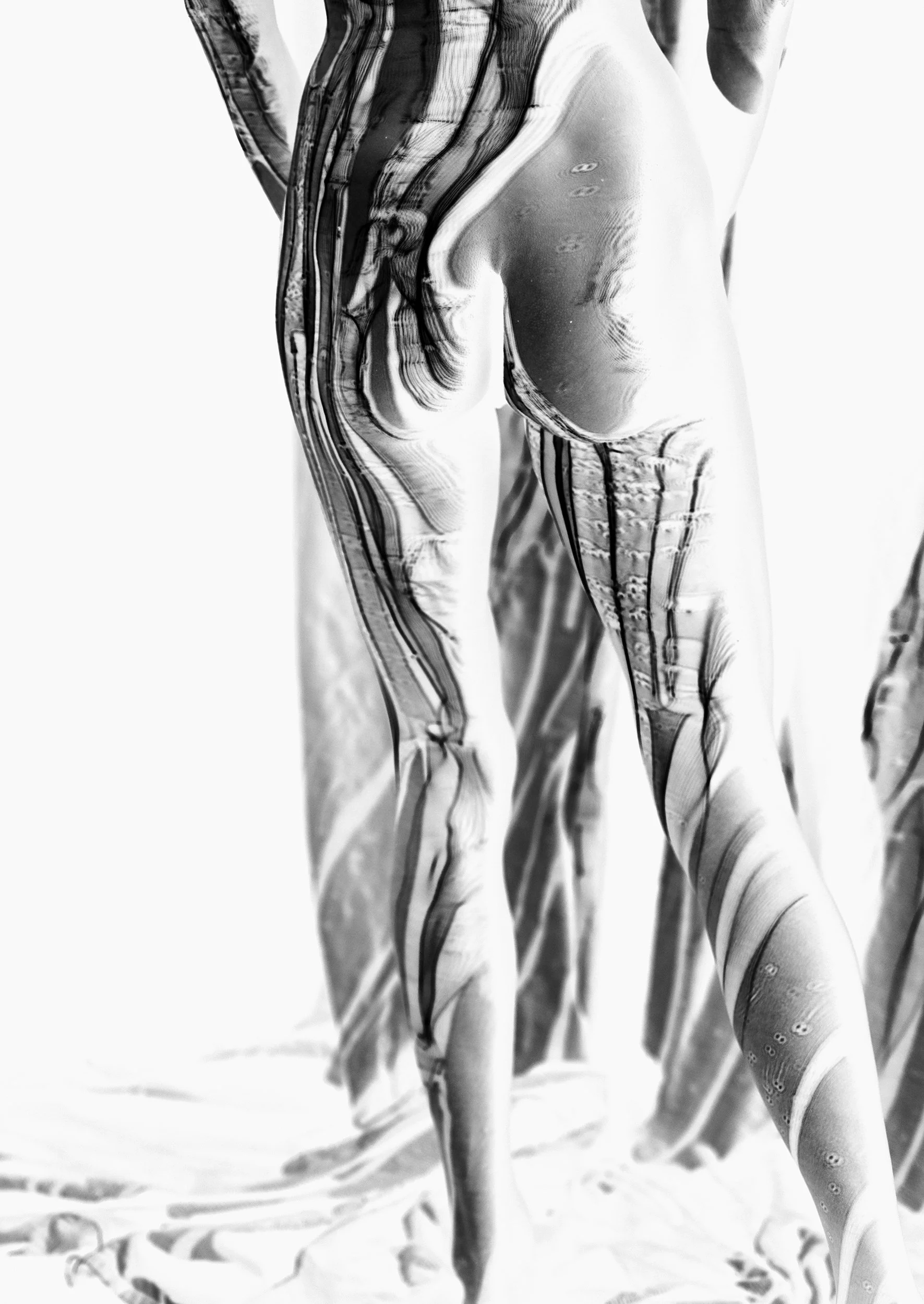 Jur Low / Jurriaan Löwensteyn — From the ongoing series No Light, 2026. Digital Photograph, 85x120 cm. Fragmented human form traced by flowing black and grey lines against a white background.
Performer: Pleuni Veen
