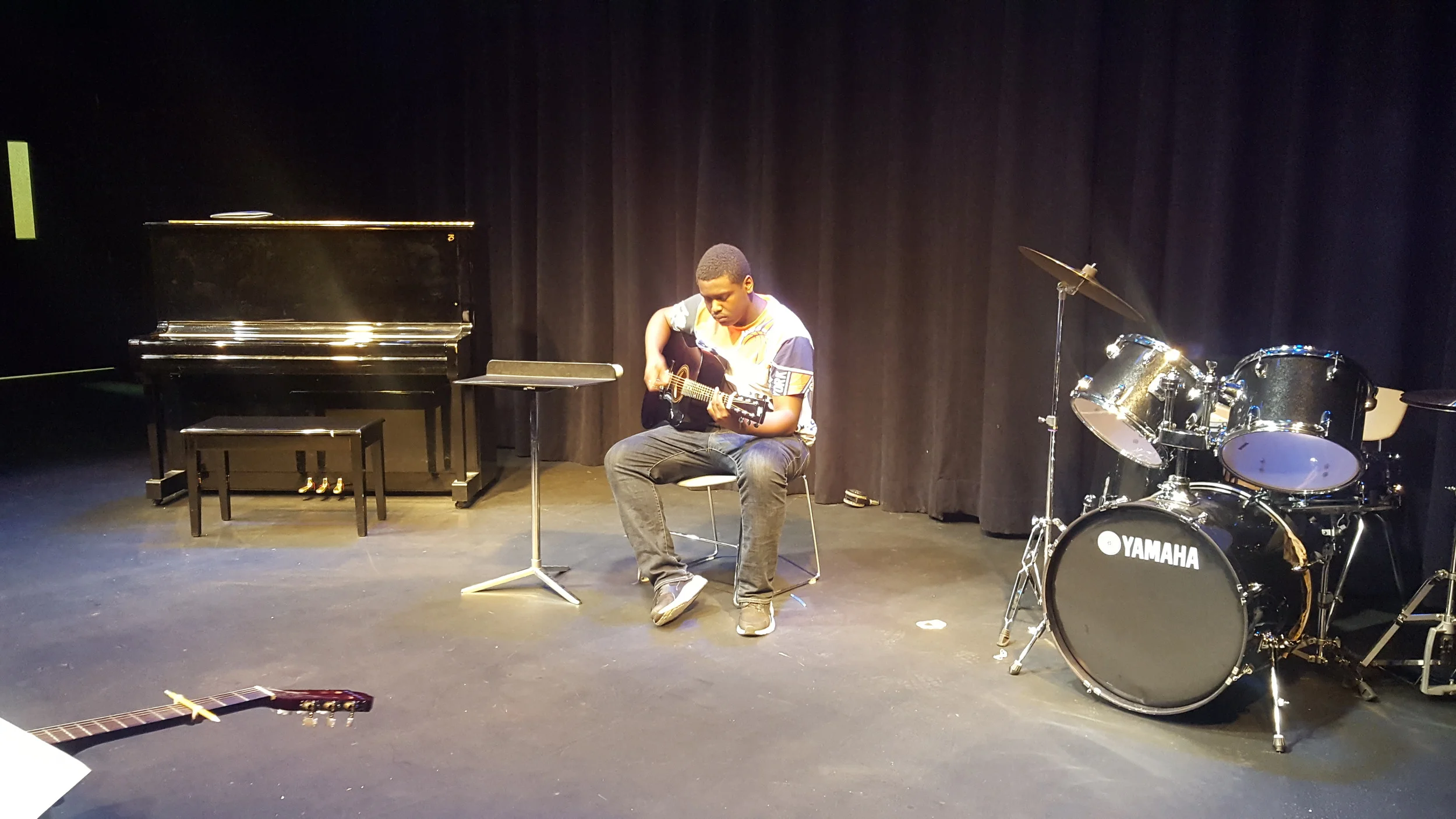 Sophomore Gary Bacchus on guitar