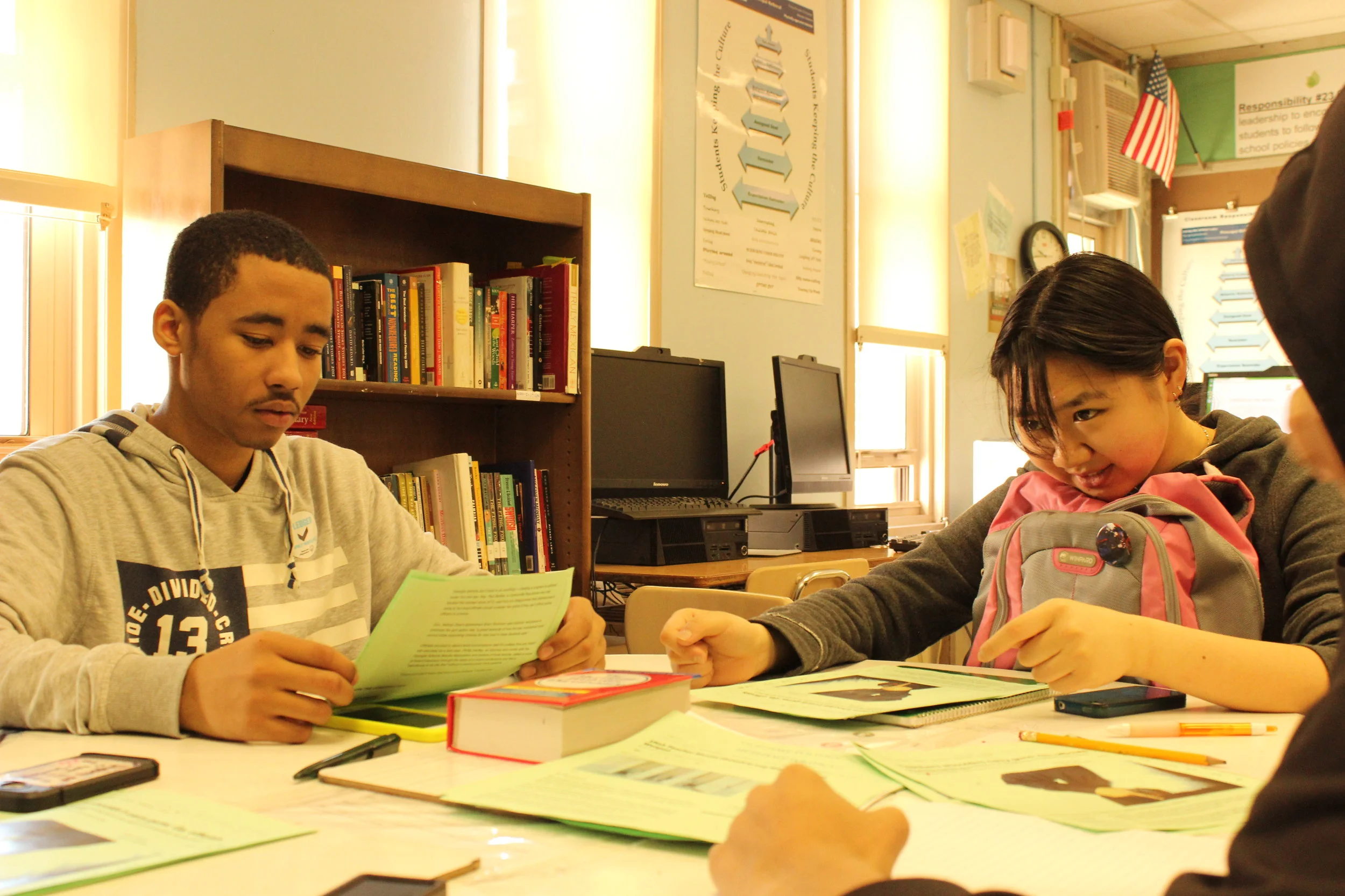 Sophomores Dijon Pleasant and Winnie Zhu debate an author's intention