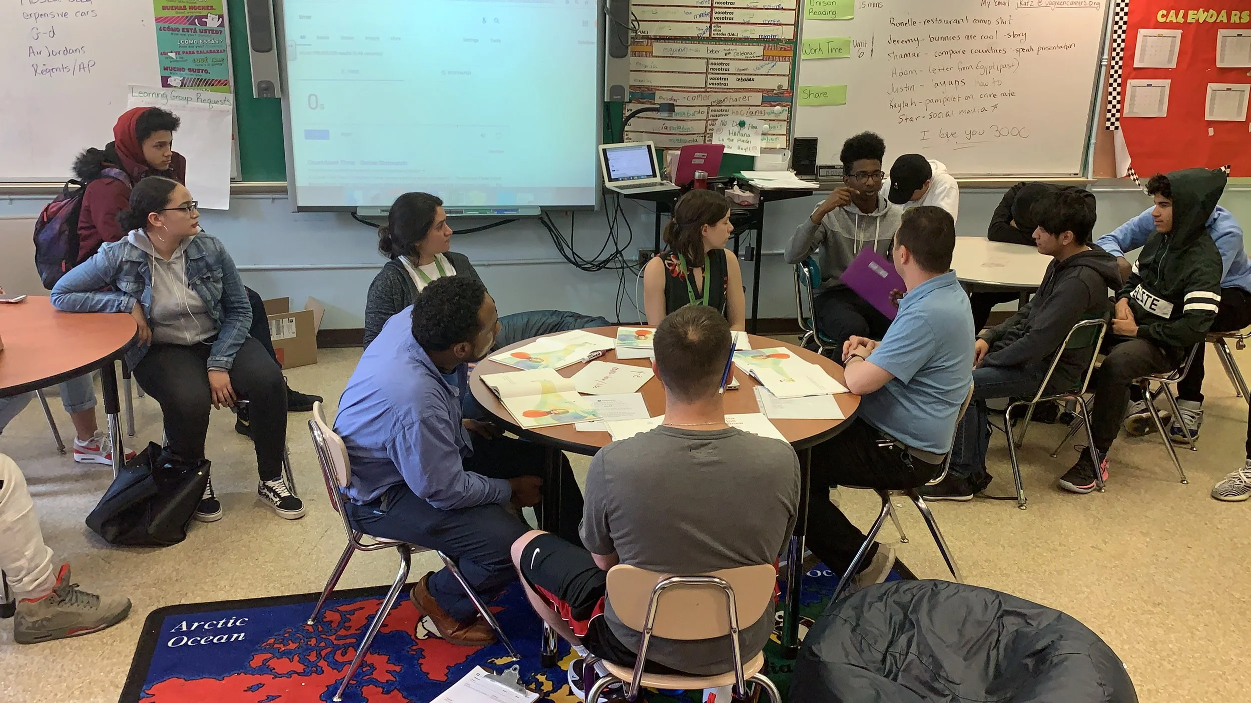 Teachers and students engaging in a FISHBOWL professional development and learning experience in an AP Spanish class.