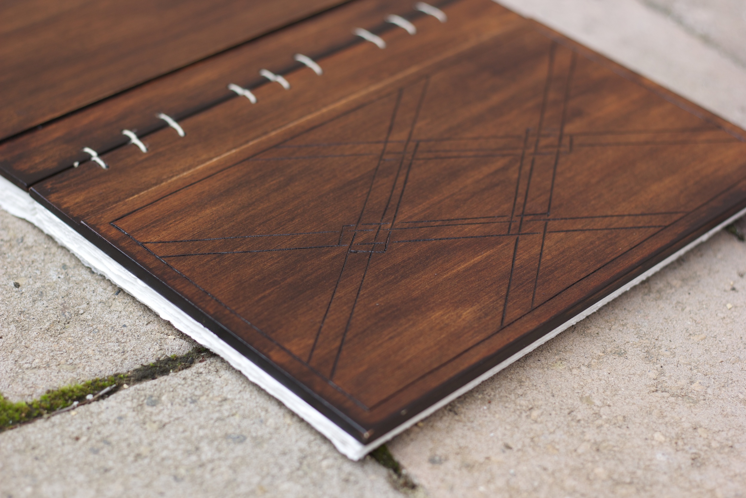  Kickstarter project. Wood-cover journal. Pyrography on front cover. 2013.&nbsp; 