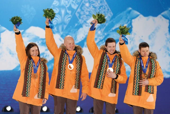 Rubenis on the podium with fellow Olympic bronze medals winners of the luge team relay event in February, 2014. 