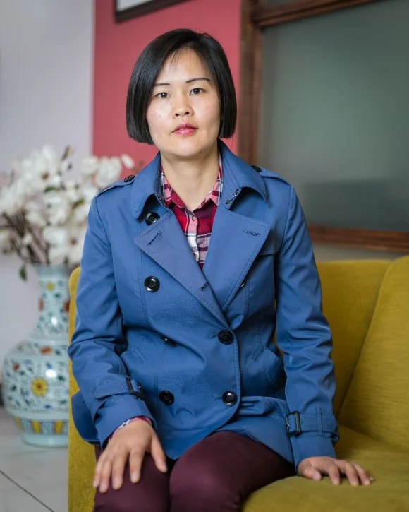 Jiang Li who was a guest speaker at the art exhibition by AAFOH. Li’s father died in a forced labor camp in China after being persecuted by communist authorities for practicing the spiritual discipline Falun Gong. (Benjamin Chasteen/Epoch Times)