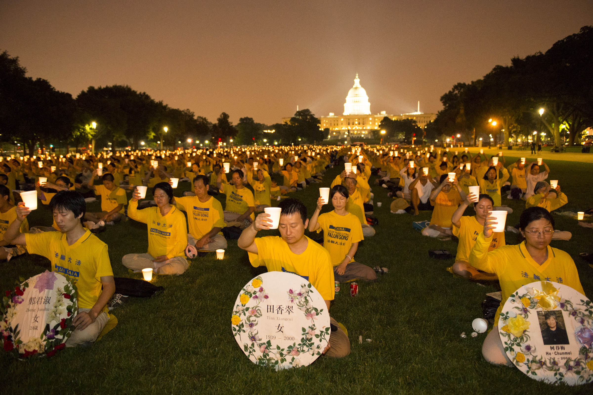  Falun Dafa practitioners in candle vigil in Washington DC . 