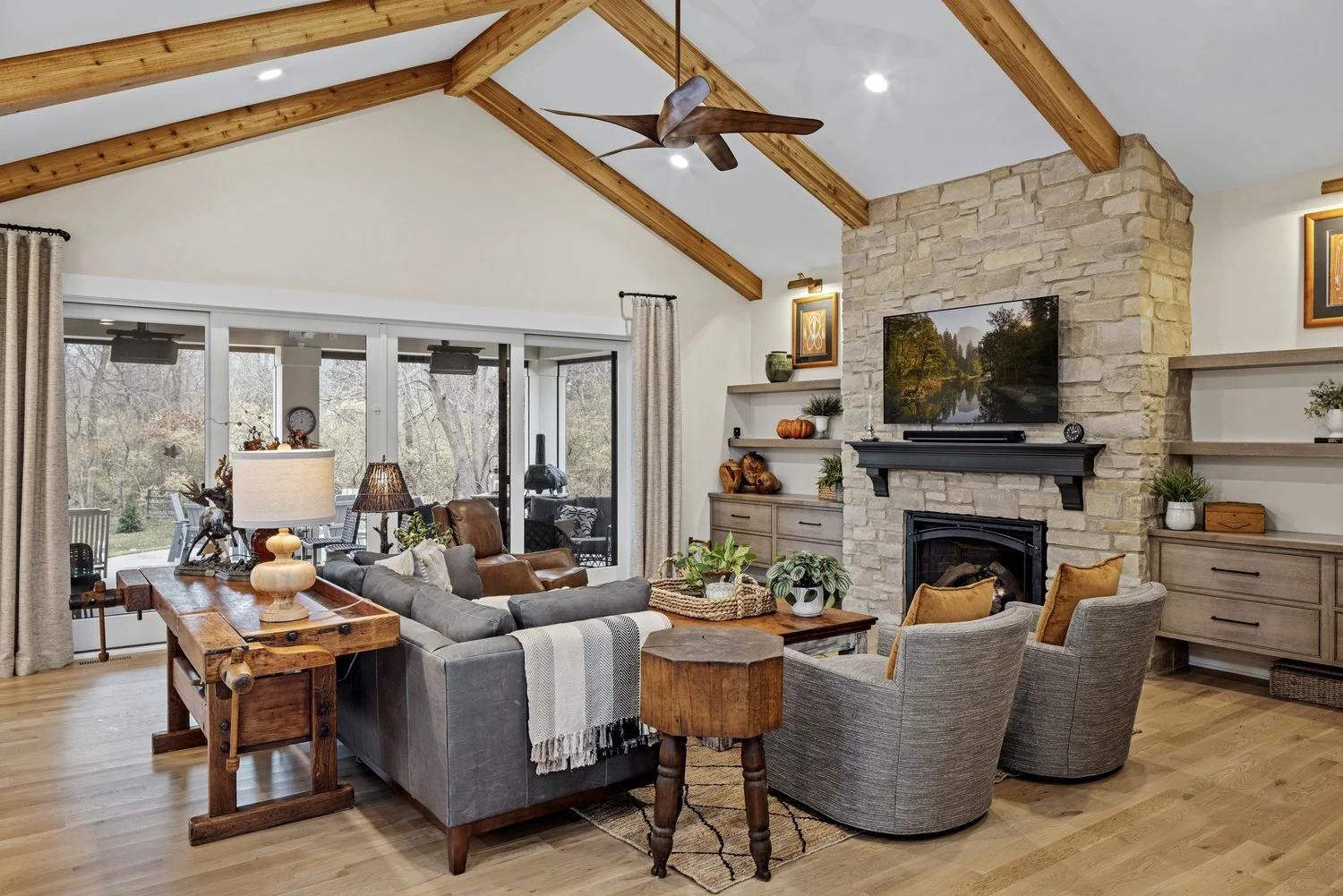 cedar posts and beams keep the warm hue of wood throughout the main living area