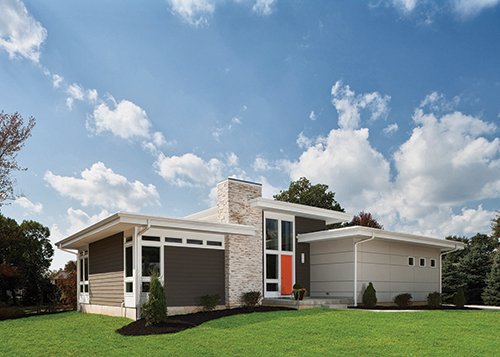 Cincinnati mid-century modern home with bright orange door, simple geometrics, flat roof, and green features