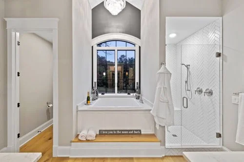 Stunning Custom Home Entrance with Arched Doorway