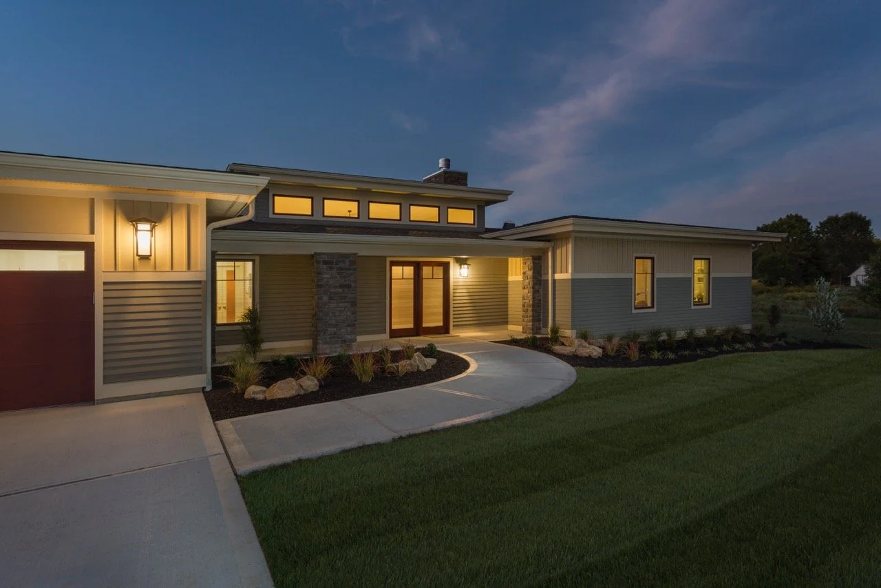 bold colors, horizontal lines, and multiple textures accentuate the exterior of this Cincinnati modern home