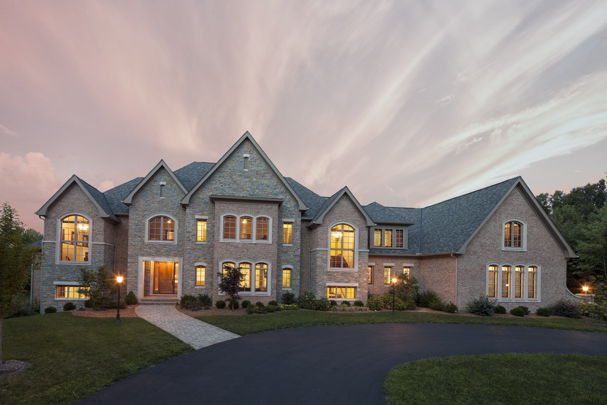 gorgeous as the sunset, this 10,000-square-foot home pleases from every angle