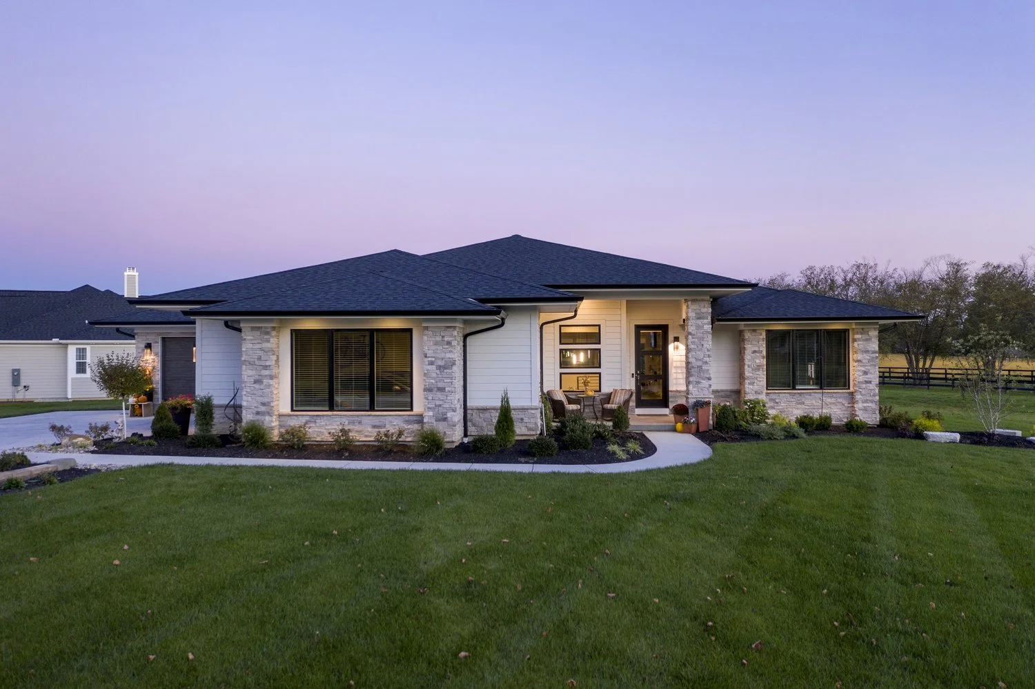 modern home with beautiful and natural elements with horse farm views