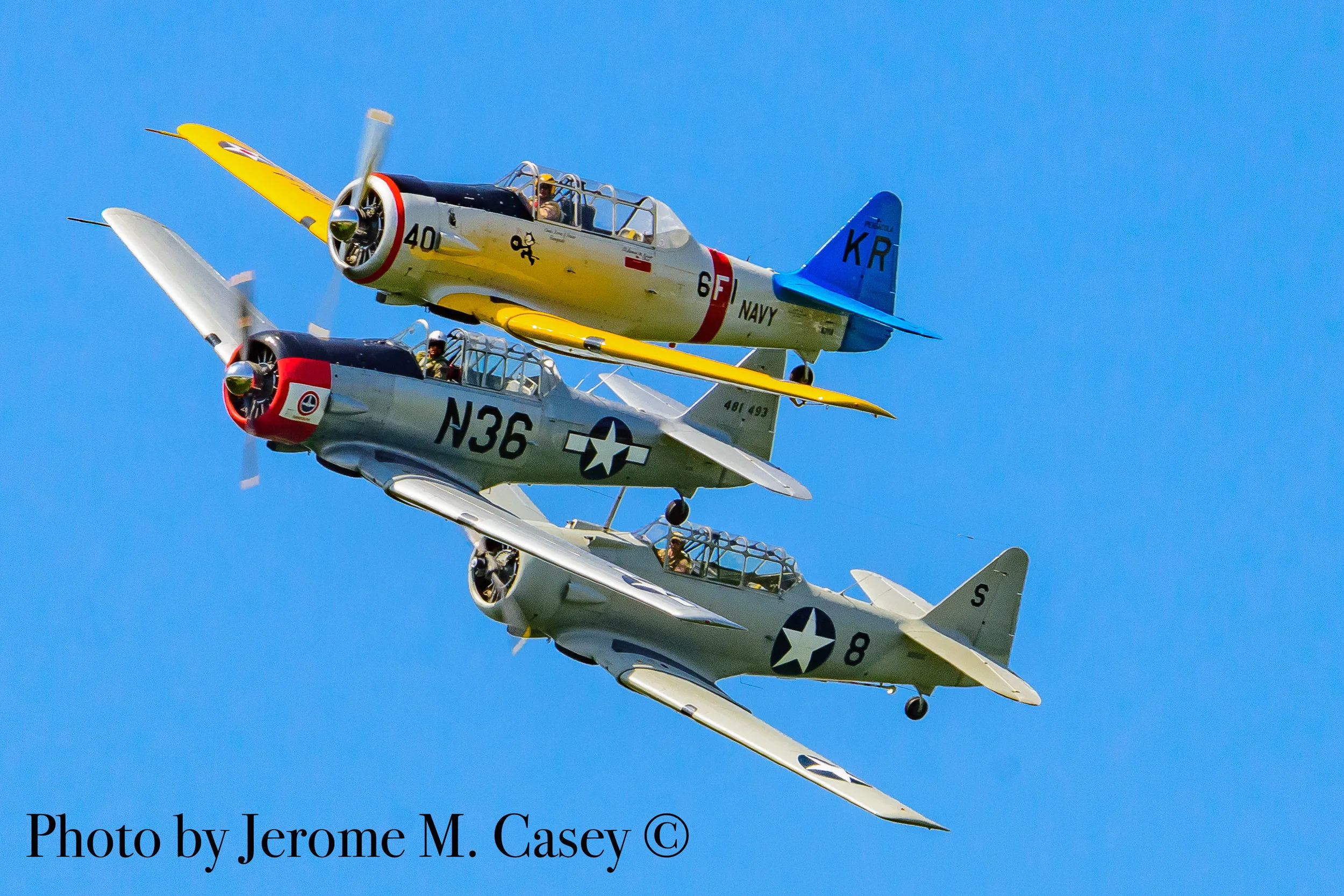 US military single engines planes stack up flying in formation-2.jpg