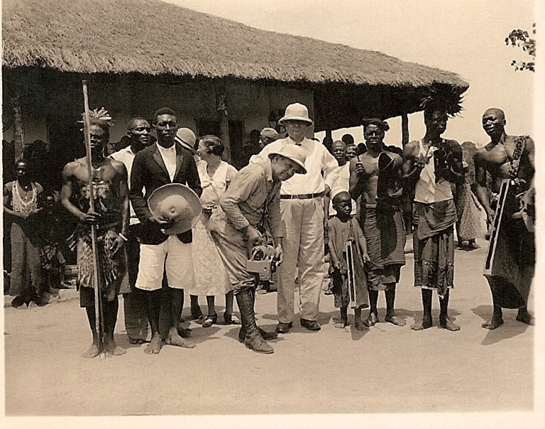  "The reception party at Emungu. Note little drummer boy - "Yanyi" Sunshine. Man with big hat to your left is the preacher in charge. H.T.W." 