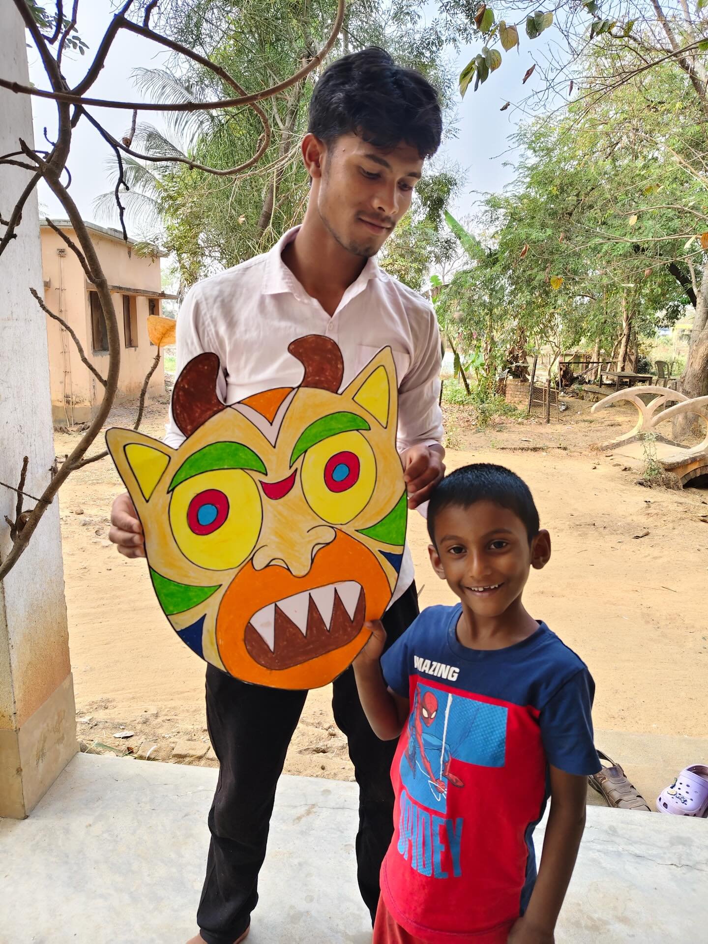 Watch out! This dynamic duo has made a terrifying mask 👹