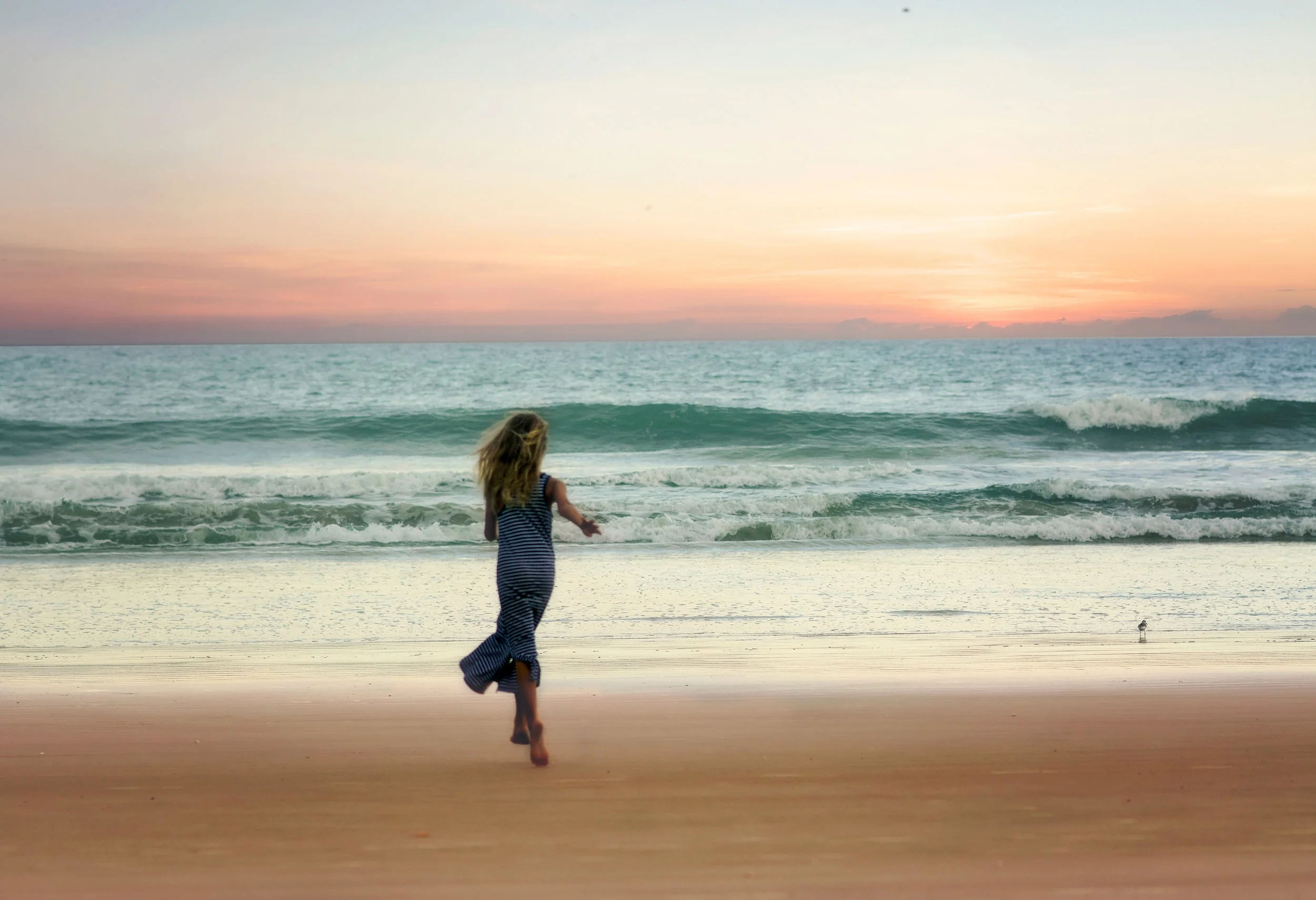 girl-running-on-the-beach.jpg