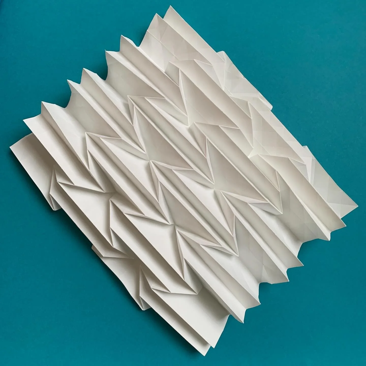 Sample folds on turquoise 
.
#fold #paper #sample #paperart #papercraft