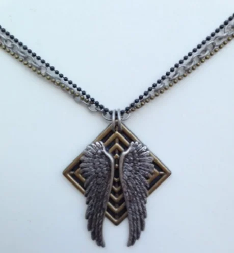 Necklace Feather on square.JPG