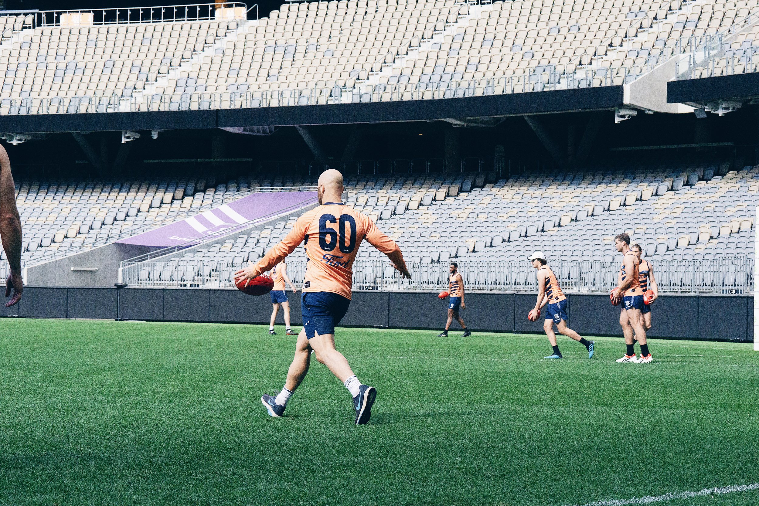  Gary Ablett in the No. 60 practices from the pocket. 