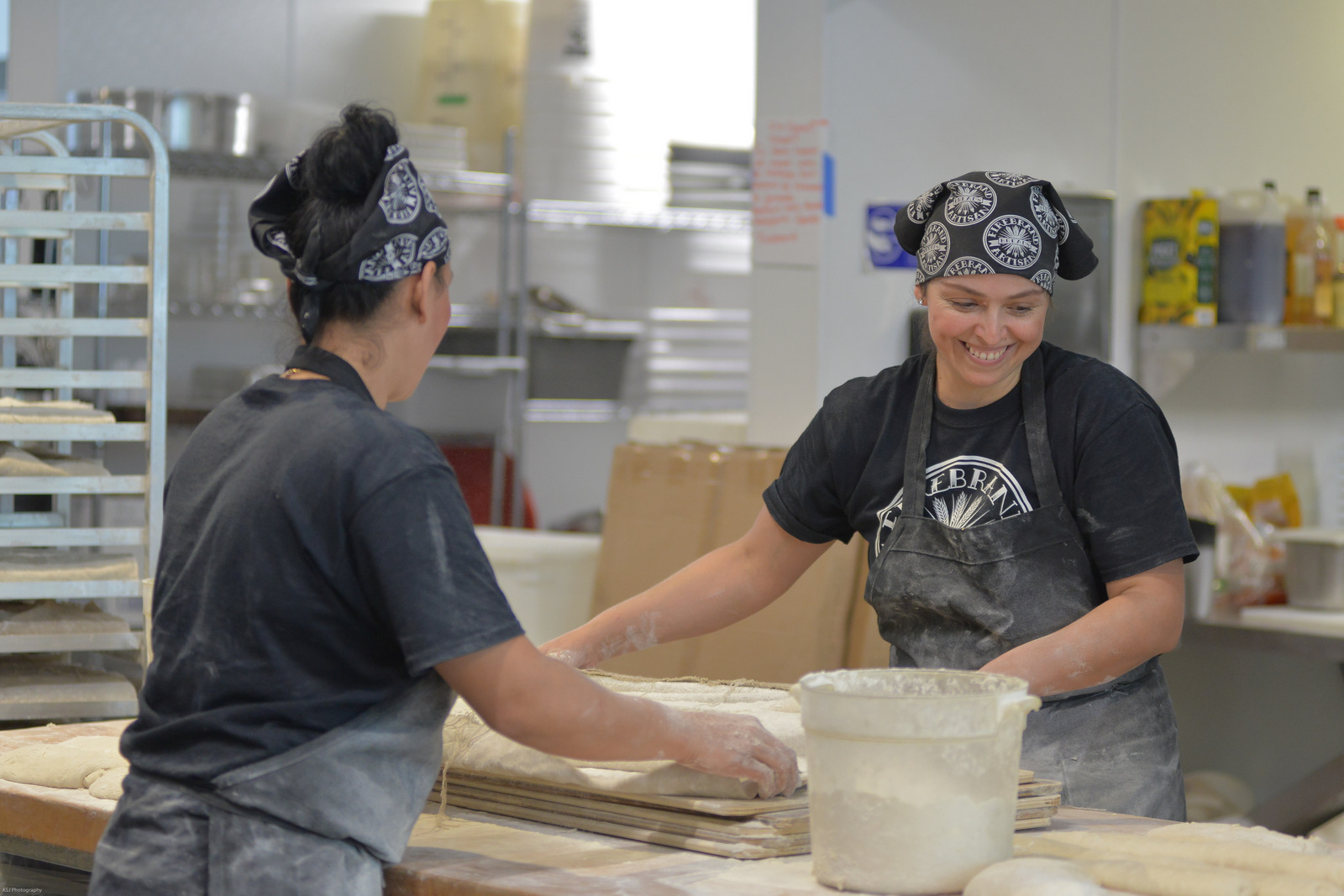 Workers at Firebrand Artisan Breads, featured in the white paper. 