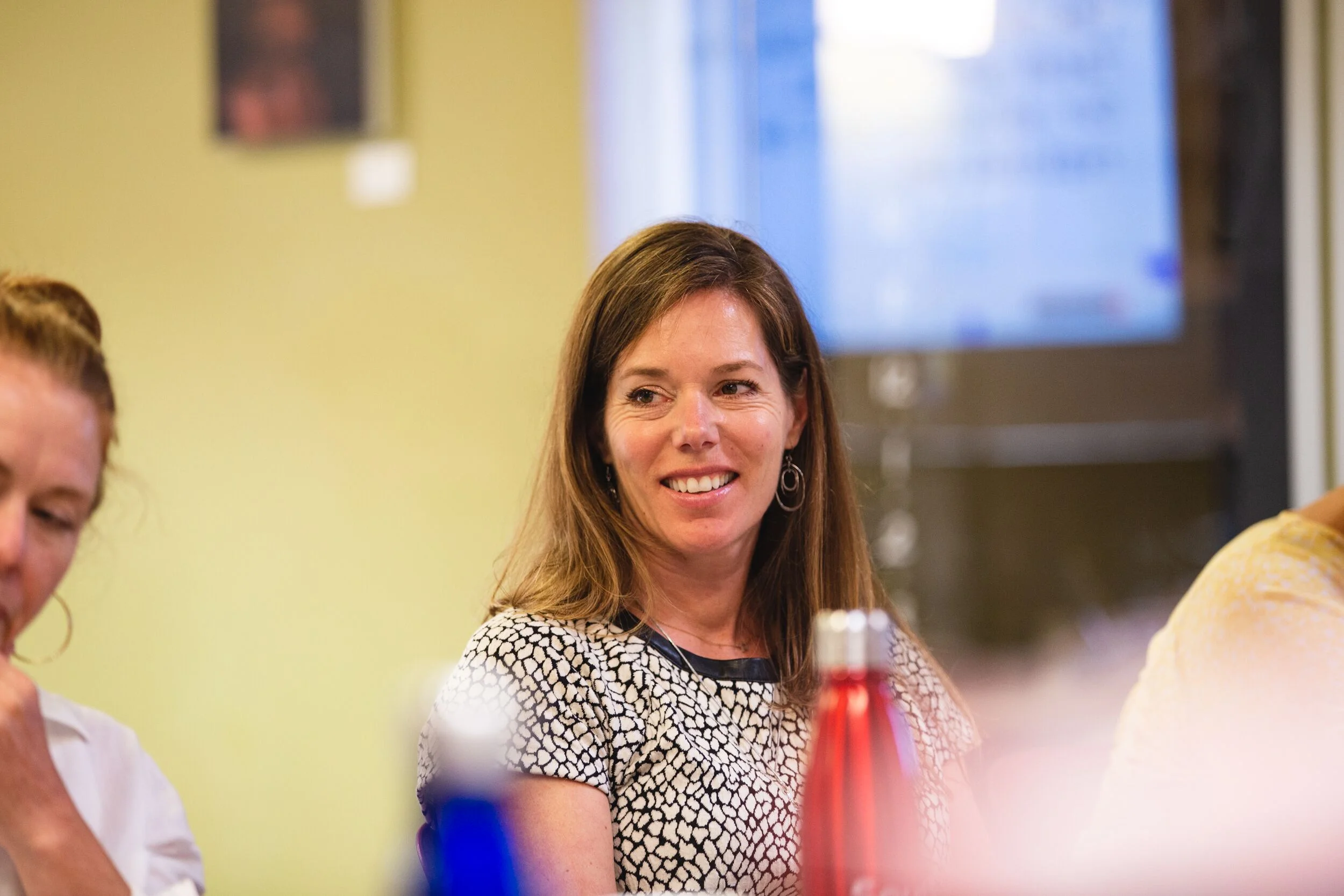 Allison Kelly, ICA Fund Good Jobs CEO listens as part of the San Jose partner visit to ICA.