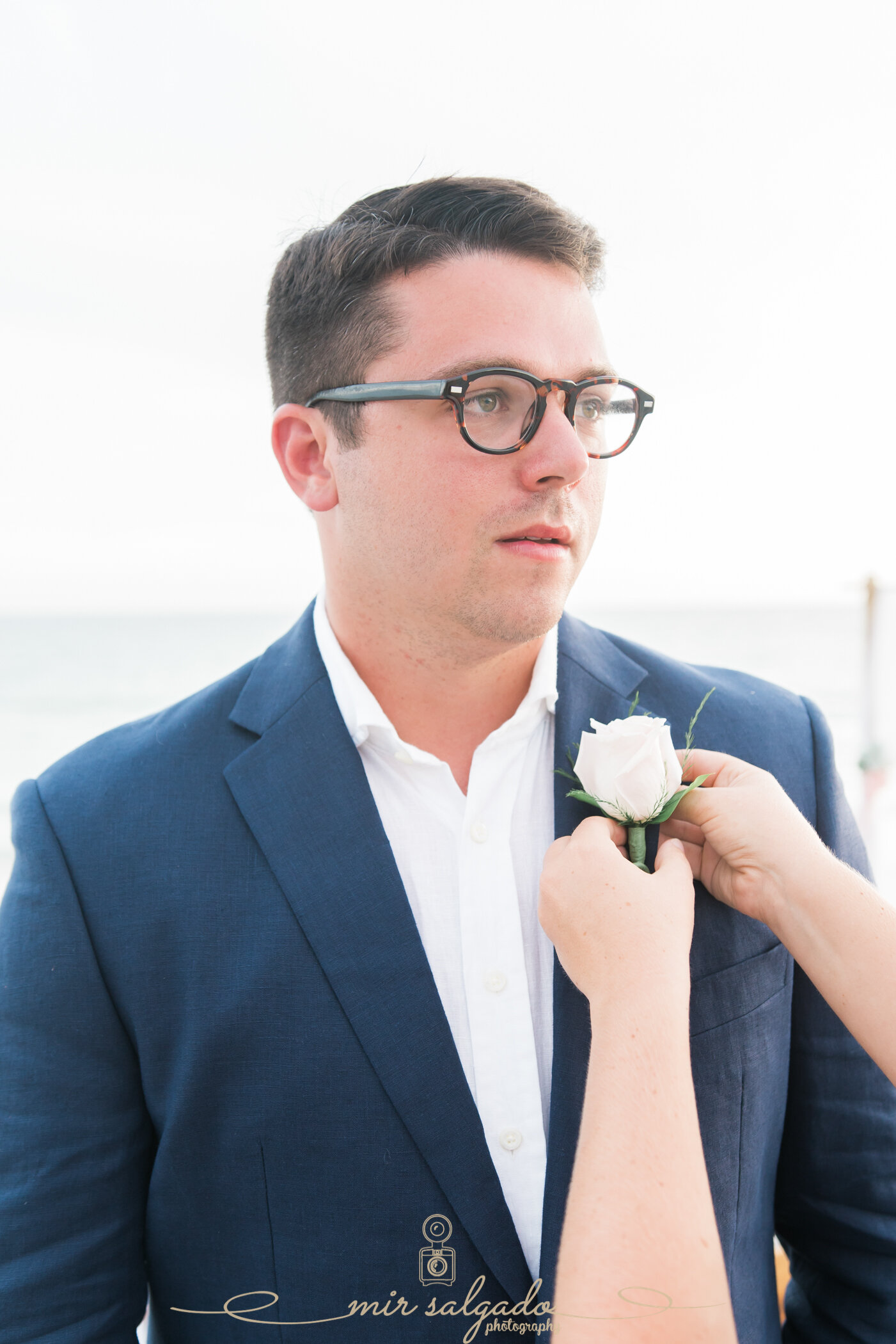 groom-attire, groom-outfit, groom-boutonnière, groom-getting-ready-for-wedding