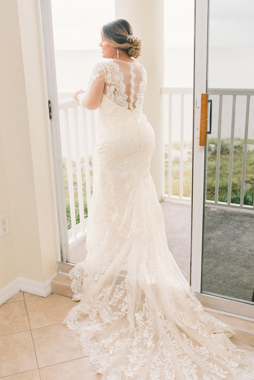 long-sleeve-wedding-dress, lace-wedding-dress, wedding-dress-train, back-of-wedding-dress