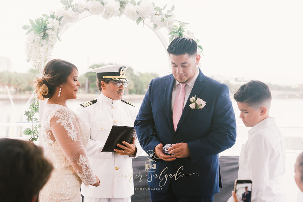 ring-exchange, ring-bearer, groom-vows, groom-vow-pictures, wedding-ceremony, yacht-wedding