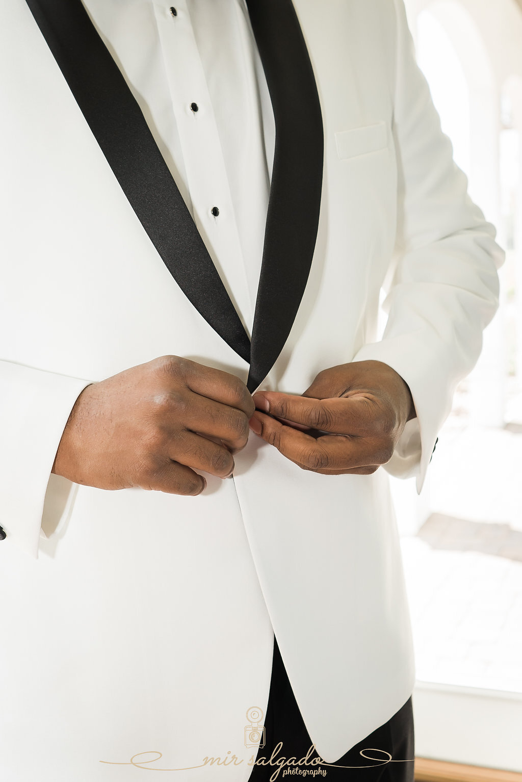 groom-wedding-suit, grooms-wedding-outfit, black-and-white-suit-coat