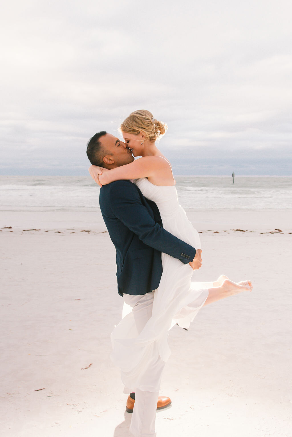 beach-wedding-poses, wedding-poses, bride-and-groom-beach-wedding, beach-wedding-photography