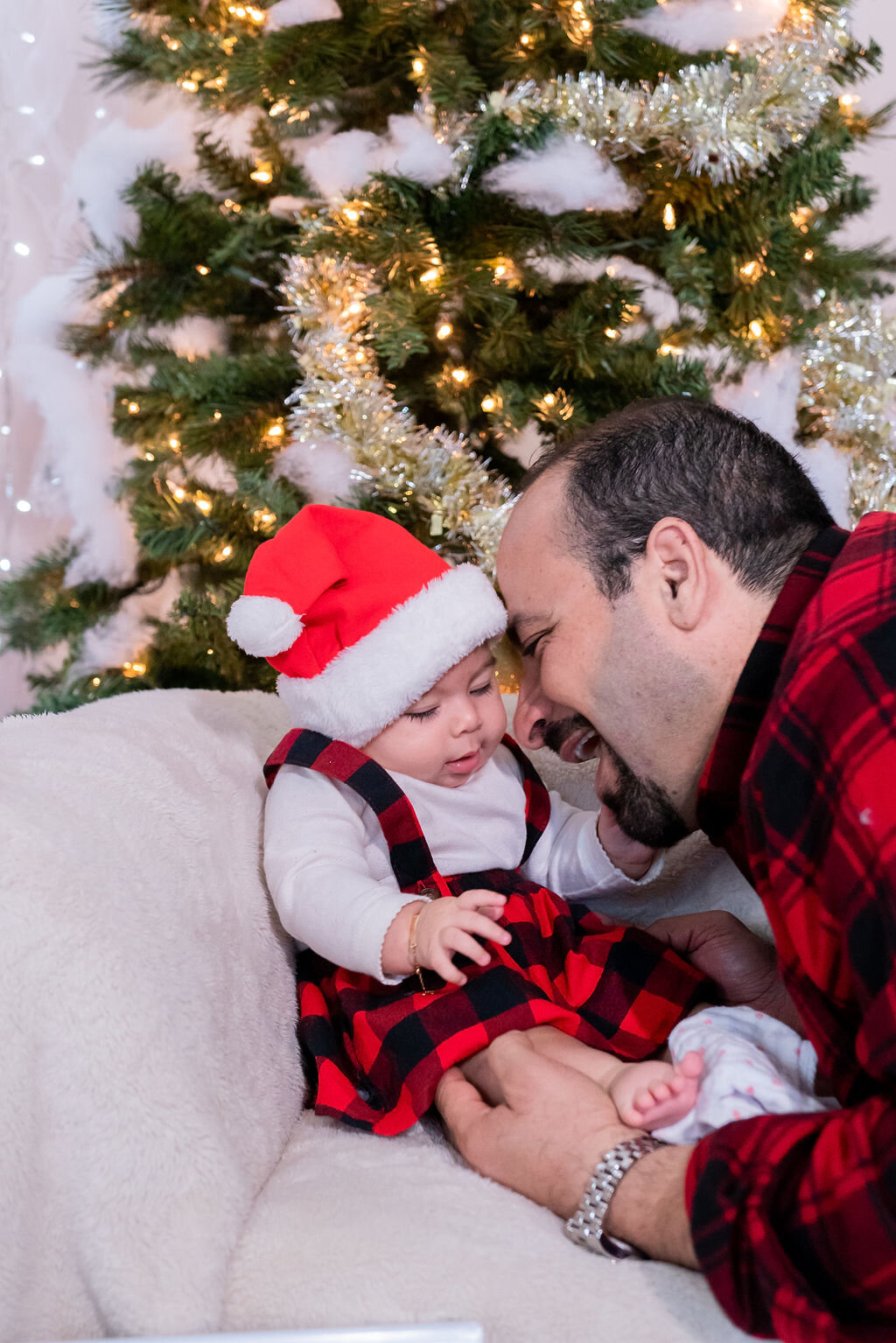 baby-and-dad-photo, holiday-photography, baby-in-santa-hat-photography, baby-and-christmas-tree, plaid-holiday-baby-outfit