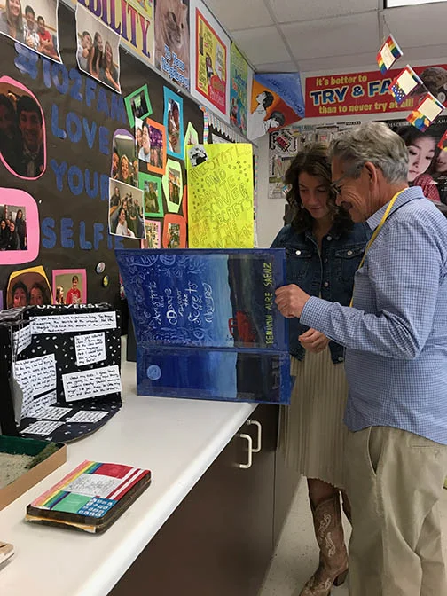 Ben & Liz looking at book art project